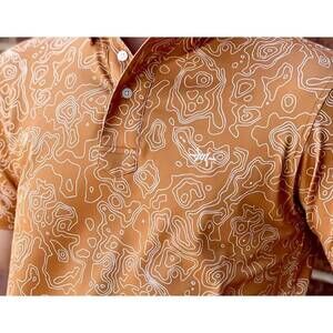 NEW TEXAS STANDARD big bend topo polo in burnt orange